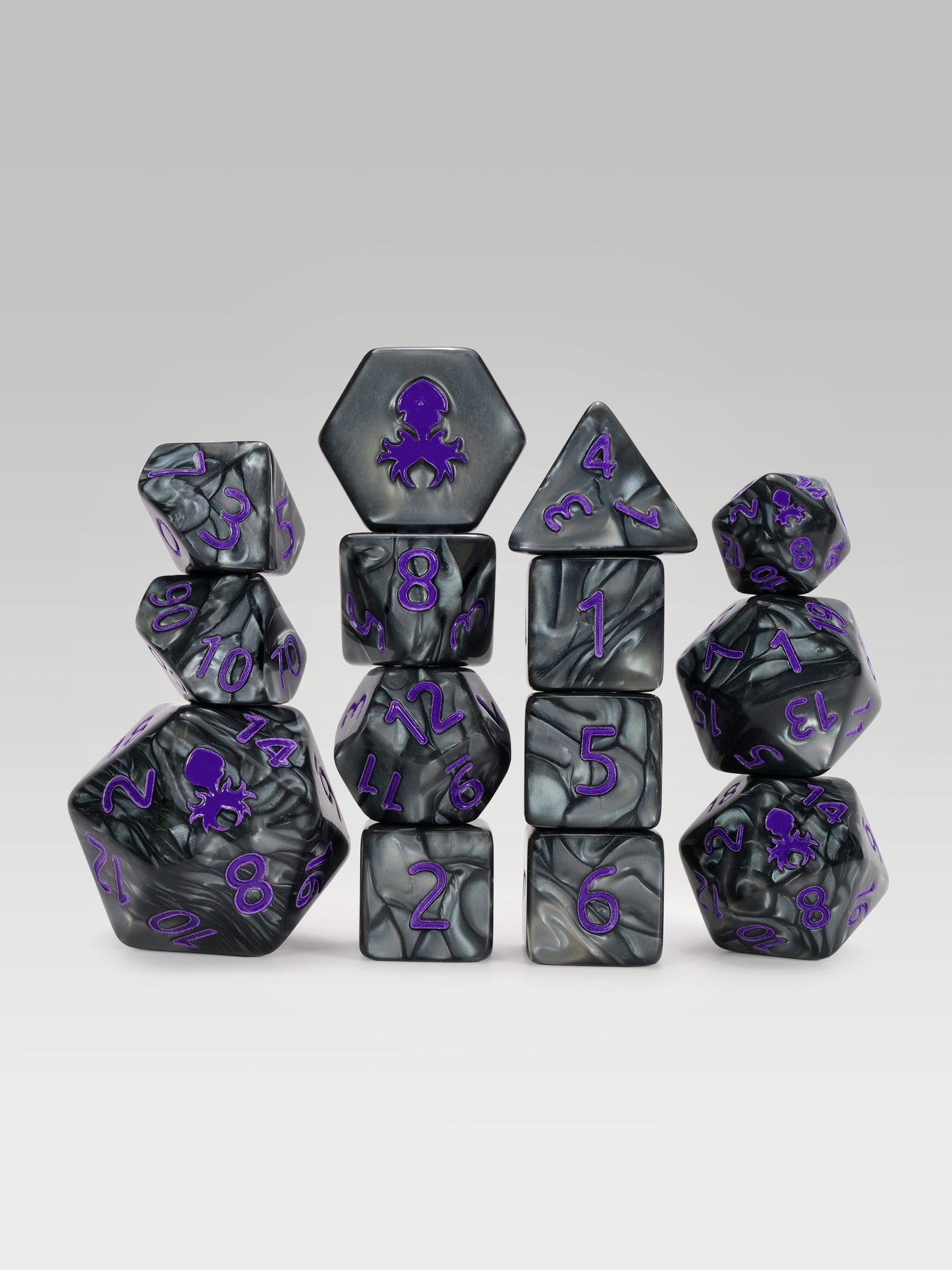 Kraken's Signature Black 14pc Dice Set inked in Purple